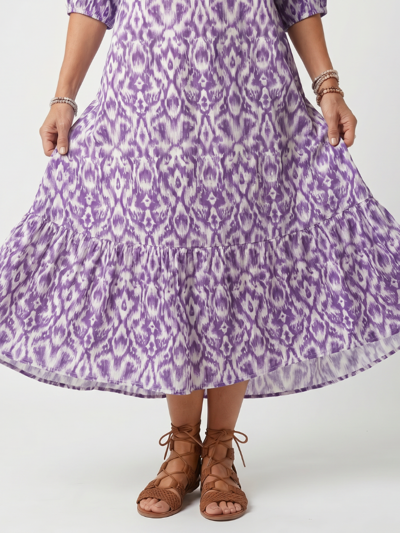 Pénélope | Robe midi à imprimé et liens à franges