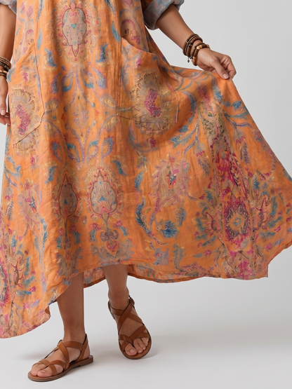 Remi | Robe midi oversized à poches imprimée avec décolleté en V
