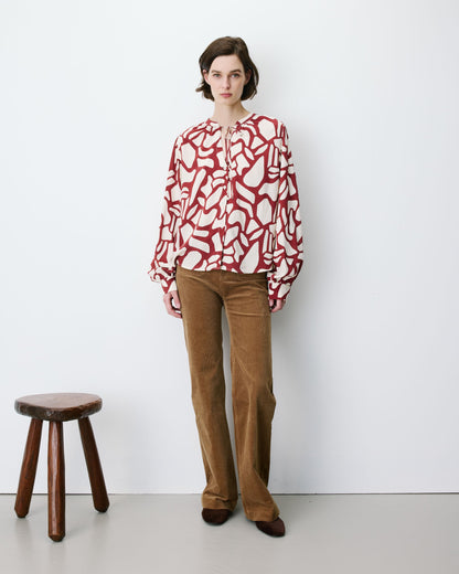 Blouse col V à imprimé géométrique terracotta Ambrine