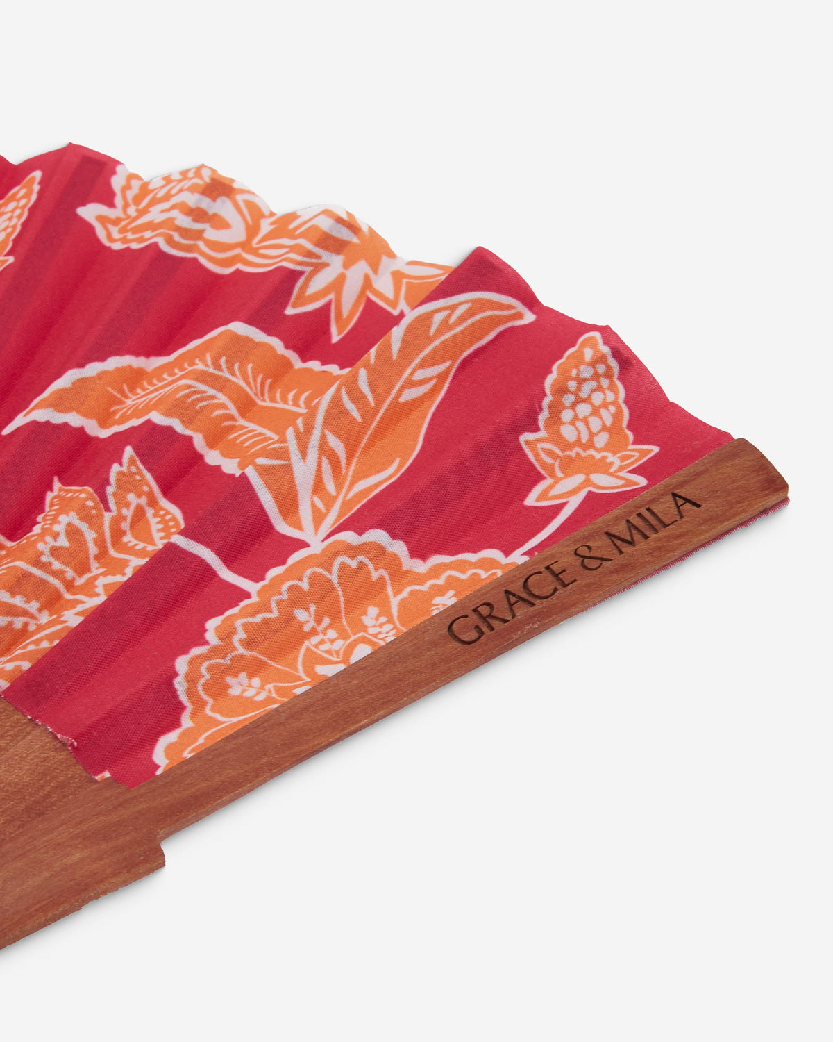 Éventail en bois et tissu imprimé floral fuchsia Weslyn