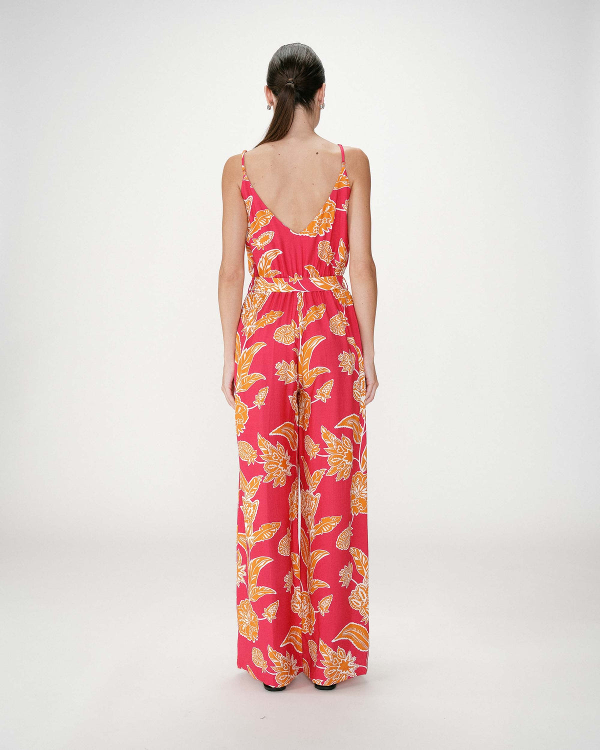 Combinaison pantalon cache-cœur bretelles fuchsia Wilderose